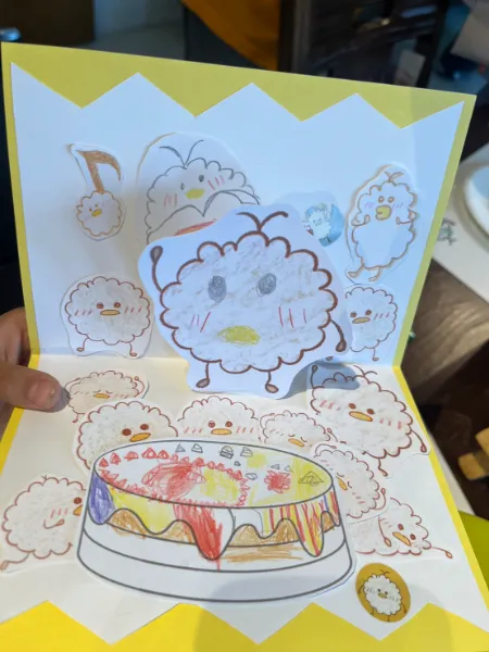 ケーキとまるぽぽを描いた作品